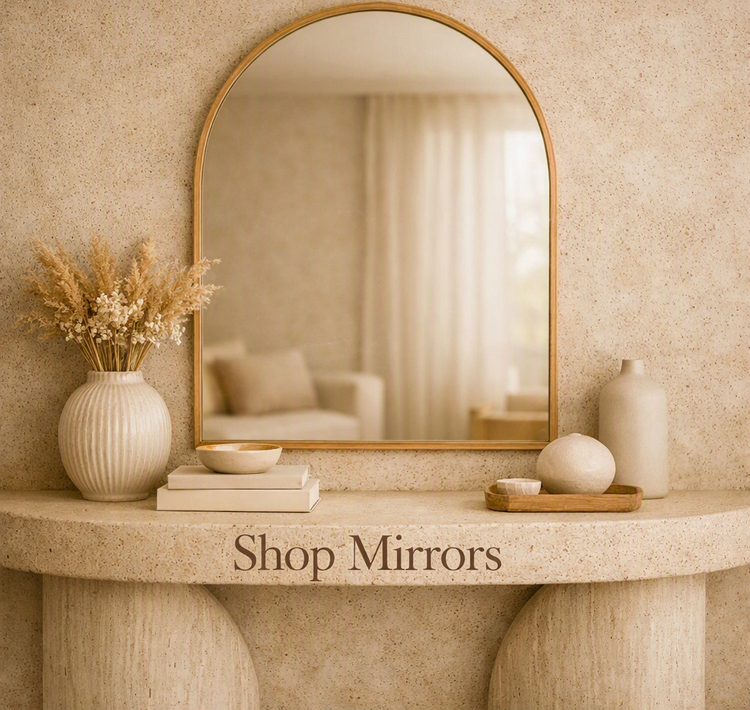 Modern wall mirrors above a textured console, enhancing warmth and curated elegance in home living.