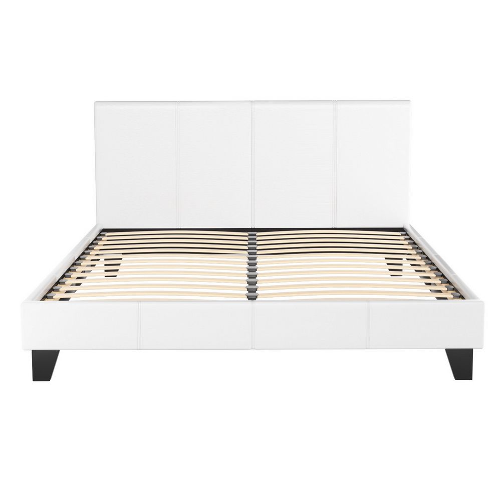 White upholstered Neo bed frame in queen size with PVC leather, stylish bedroom furniture by The Willow Stone Collective.