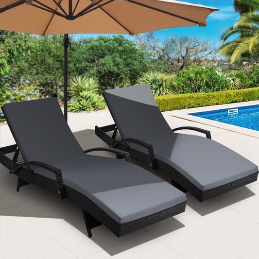 Black wicker sun lounge set with adjustable outdoor loungers and cushions by Gardeon, perfect for relaxing outdoors.