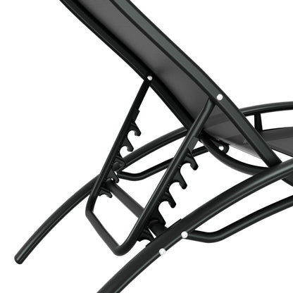 Gardeon black outdoor sun lounge set with weather-resistant steel frame, table, and chairs for patio relaxation.