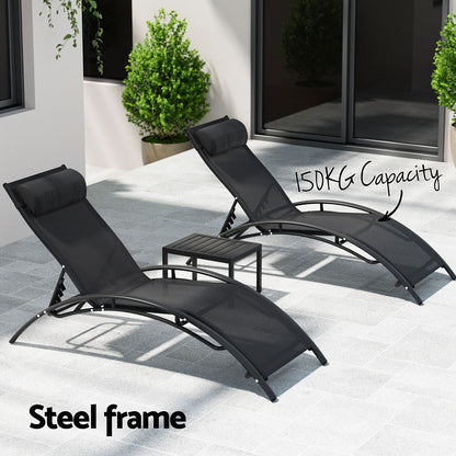 Gardeon black outdoor sun lounge set with weather-resistant steel frame, table, and chairs for patio relaxing.