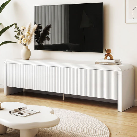 180cm white TV unit storage cabinet with fluted doors and elegant design in modern lounge setting.