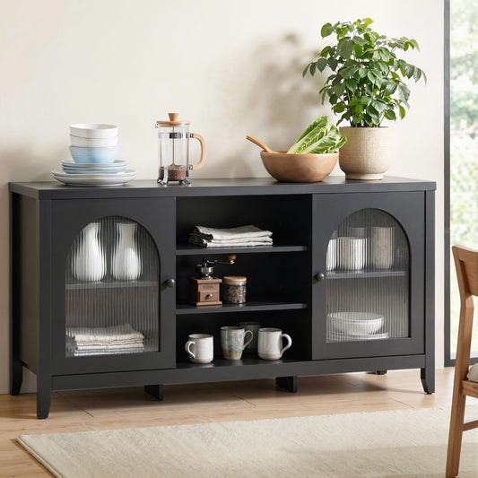 Black buffet sideboard with double doors and storage space, modern furniture piece from The Willow Stone Collective.