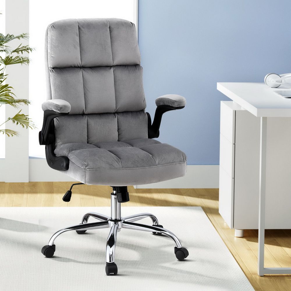 Velvet grey office chair with adjustable armrests from The Willow Stone Collective, featuring a modern design and cushioned seat.
