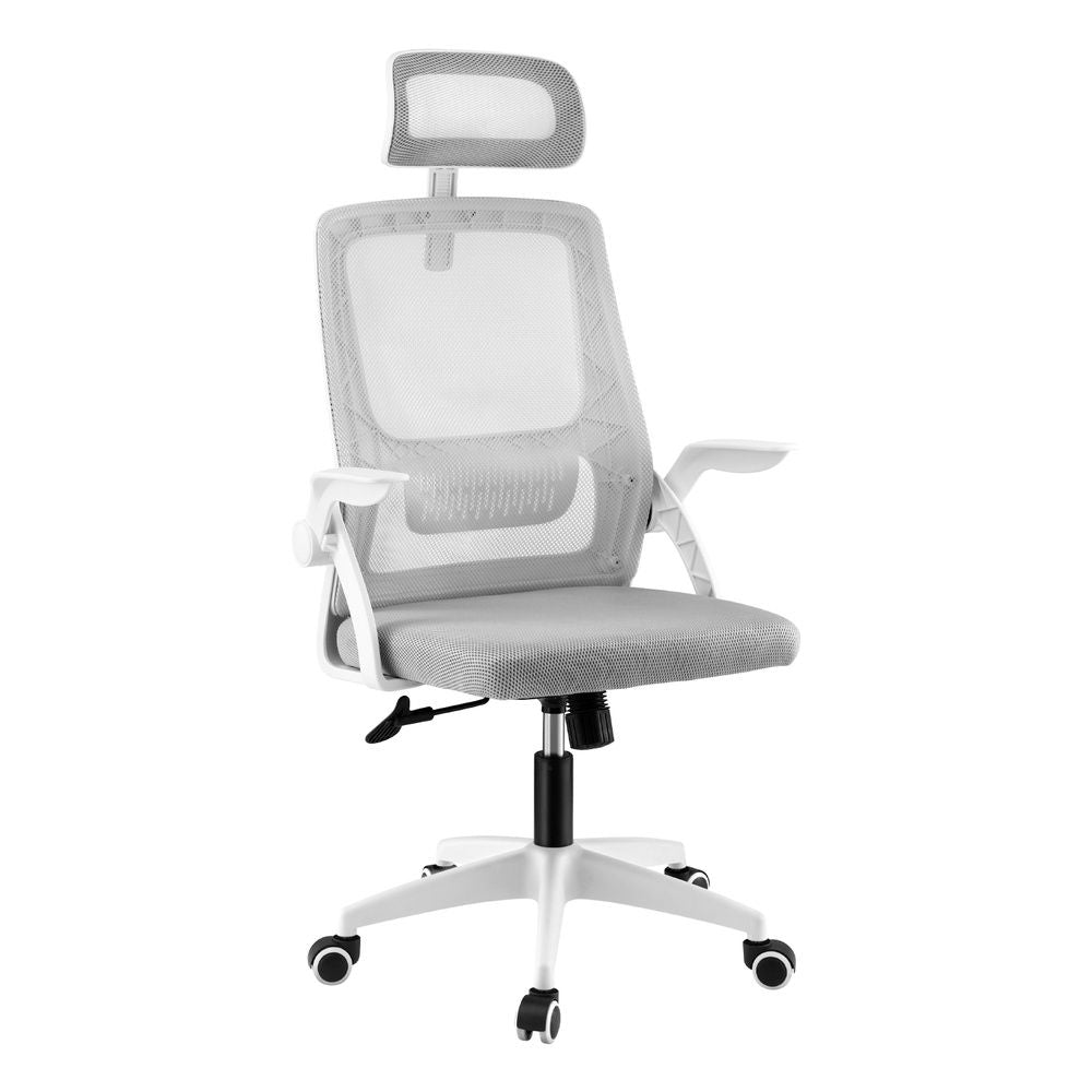 Grey mesh ergonomic office chair with adjustable headrest from The Willow Stone Collective, designed for comfortable desk work.