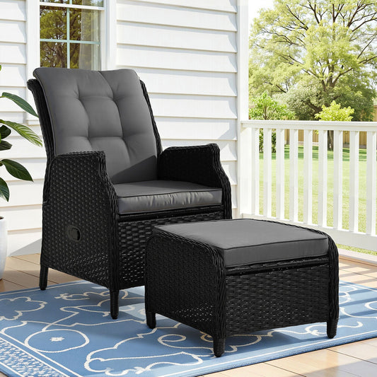 Gardeon black wicker outdoor recliner chair with matching ottoman, adjustable outdoor lounge furniture for patio or garden.
