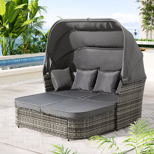 Gardeon outdoor modular wicker day bed with grey cushions and canopy, perfect for relaxing in outdoor furniture setting