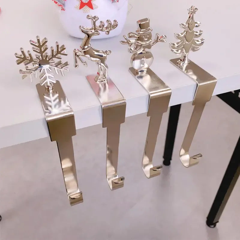 4-Pack No-Drill Metal Christmas Hooks – Gold tree and snowflake design, universal hanging bracket for fireplace mantels and door frames. (golden)