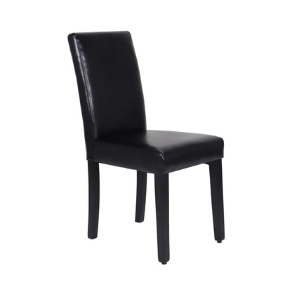 Set of two wooden dining chairs with black leatherette seats and solid pine legs, stylish kitchen and dining room furniture.