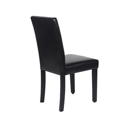 Set of two black leatherette wooden dining chairs with solid pine legs from The Willow Stone Collective.
