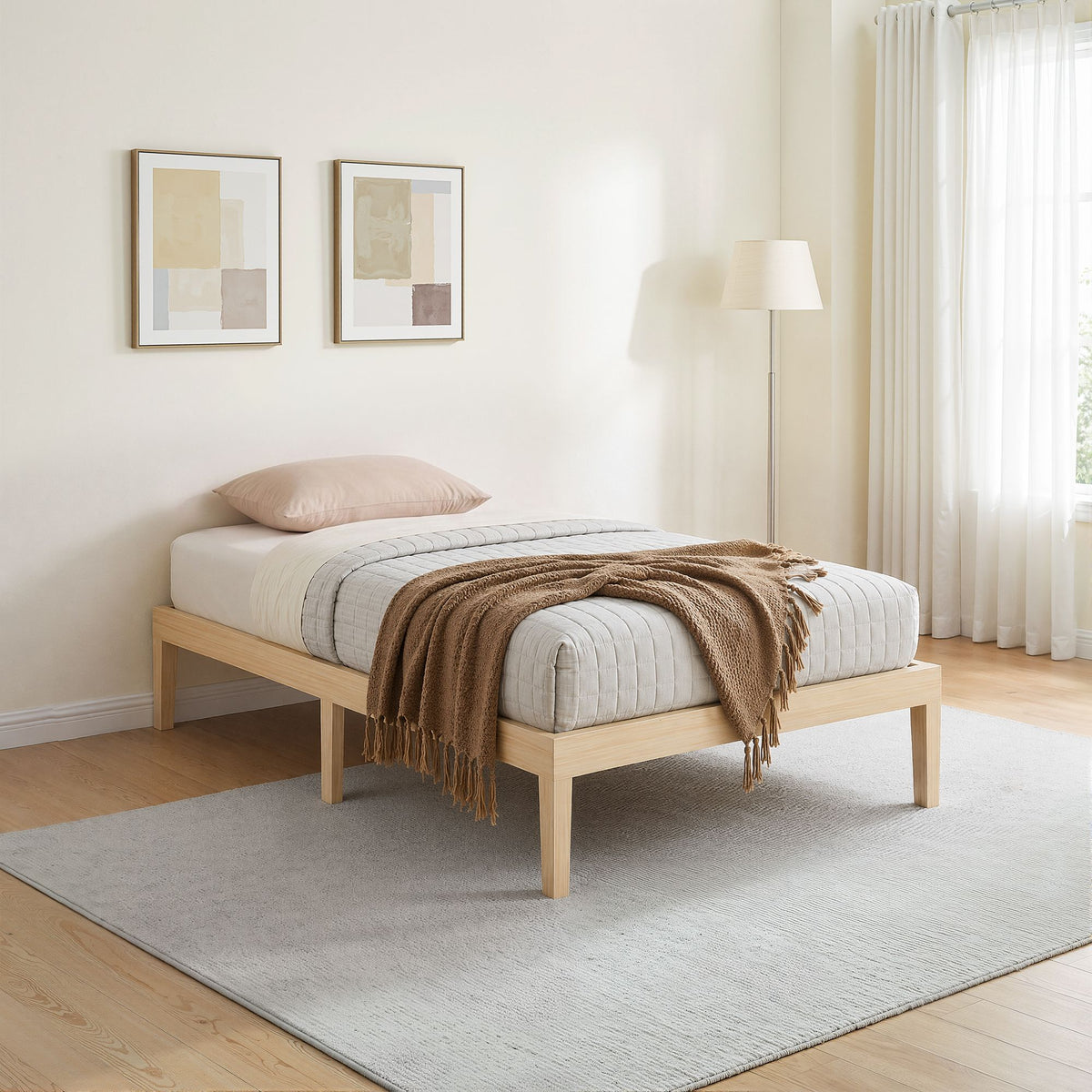 Bruno wooden bed frame in solid pine, single size, showcasing a sleek, natural finish with sturdy construction and minimalist design.