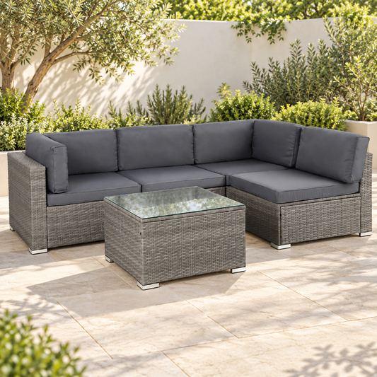 grey five piece outdoor sofa in an outdoor setting.